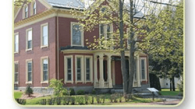a tree in front of a building