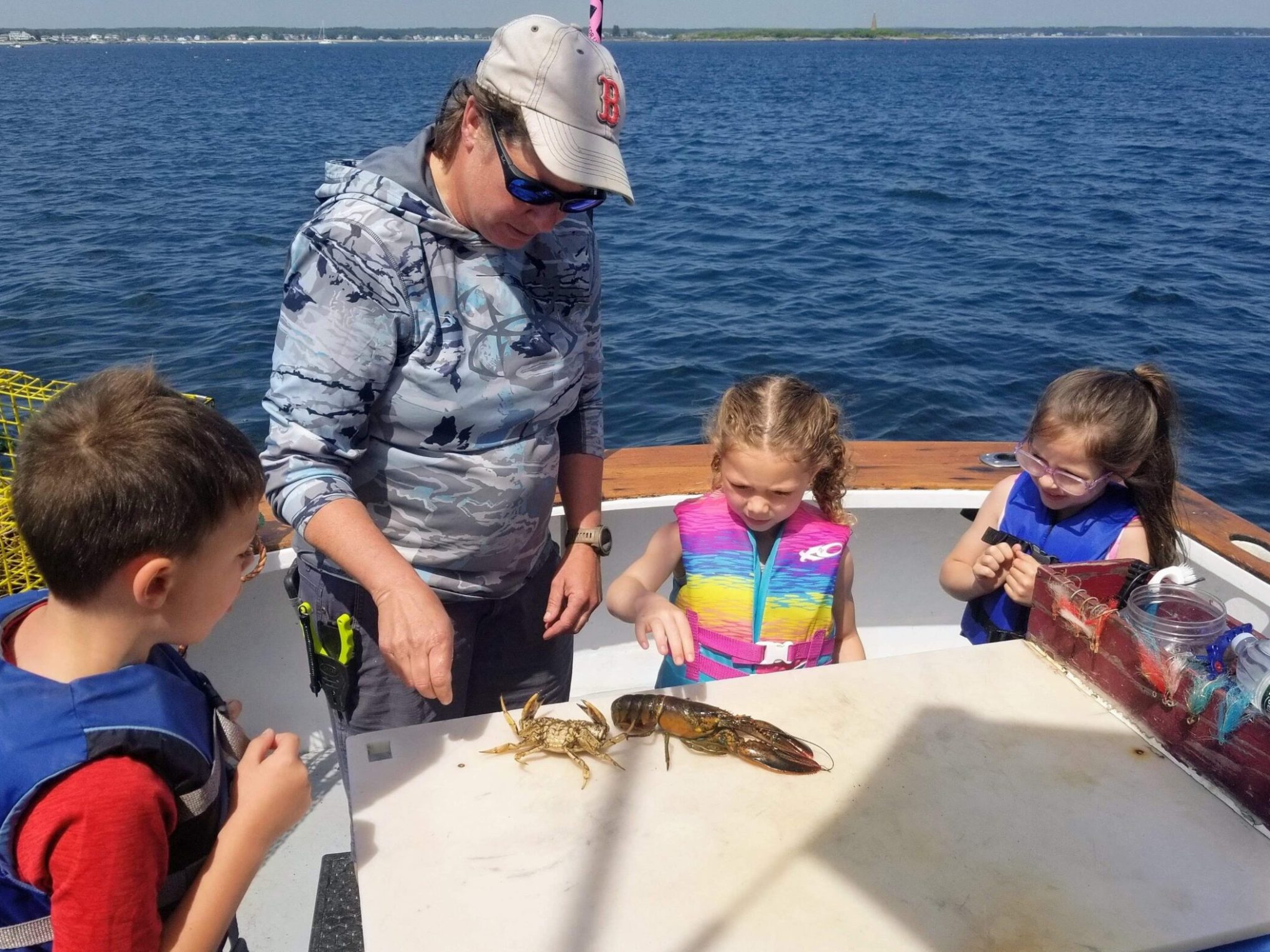 a young boy cutting a cake