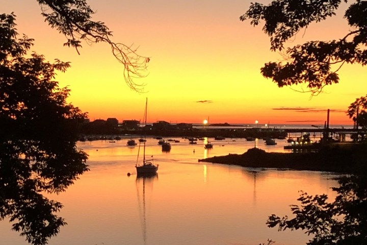 a sunset over a body of water