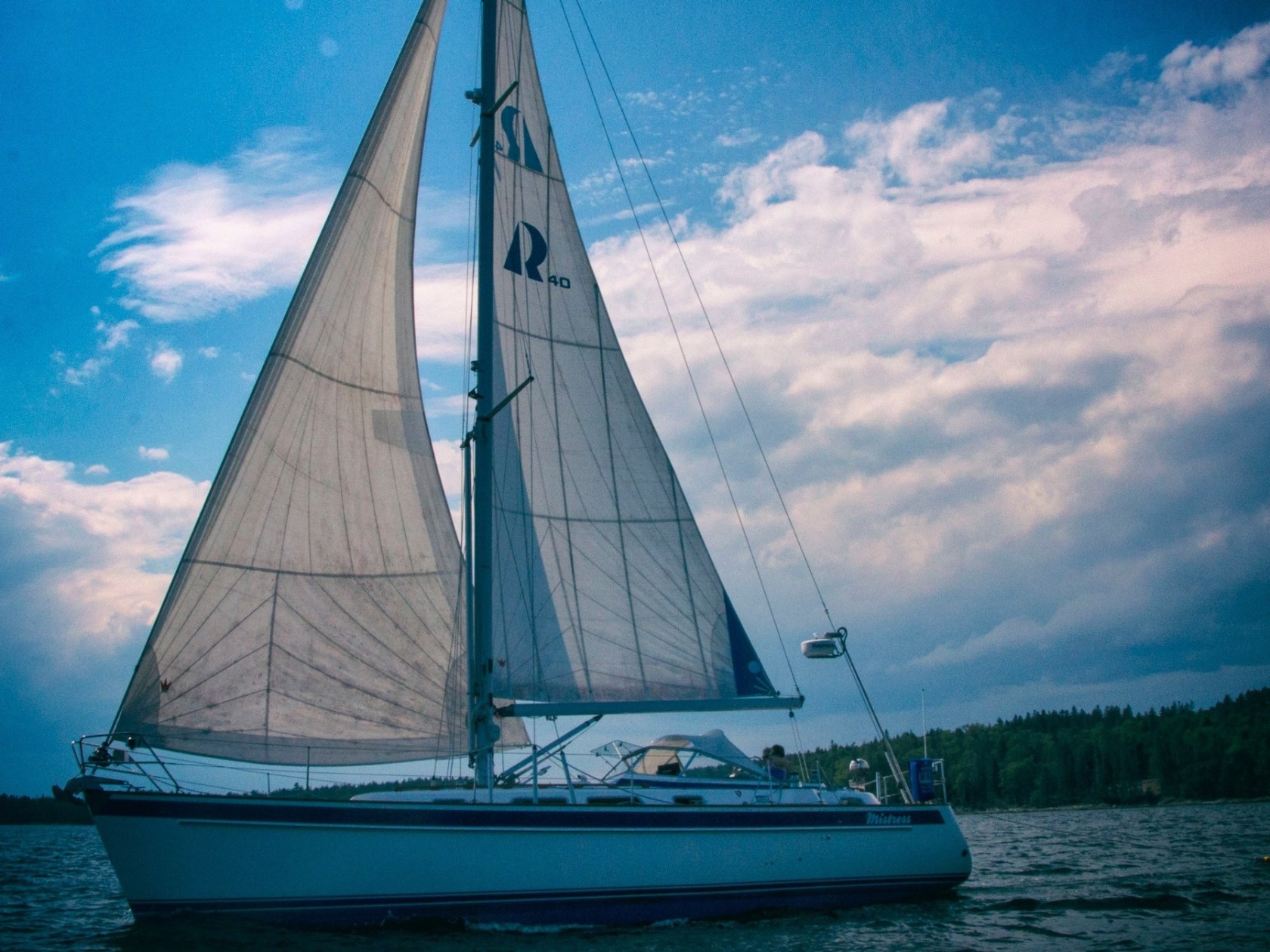 a small boat in a large body of water