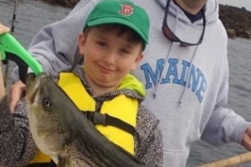 a little boy wearing a hat