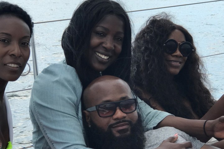 a couple of people that are wearing glasses and smiling at the camera