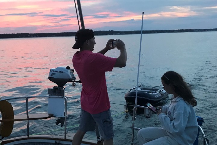 a man in a boat on a body of water