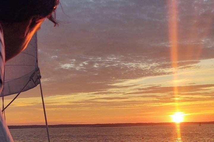 a sunset over a body of water