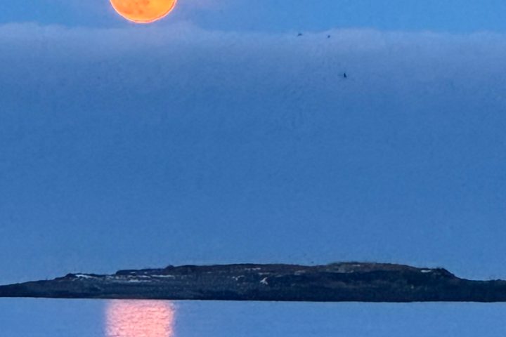 moon over a body of water