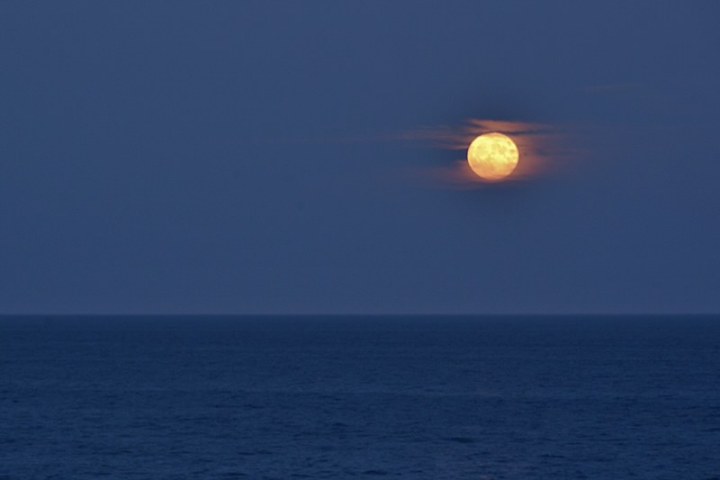 moon over a large body of water