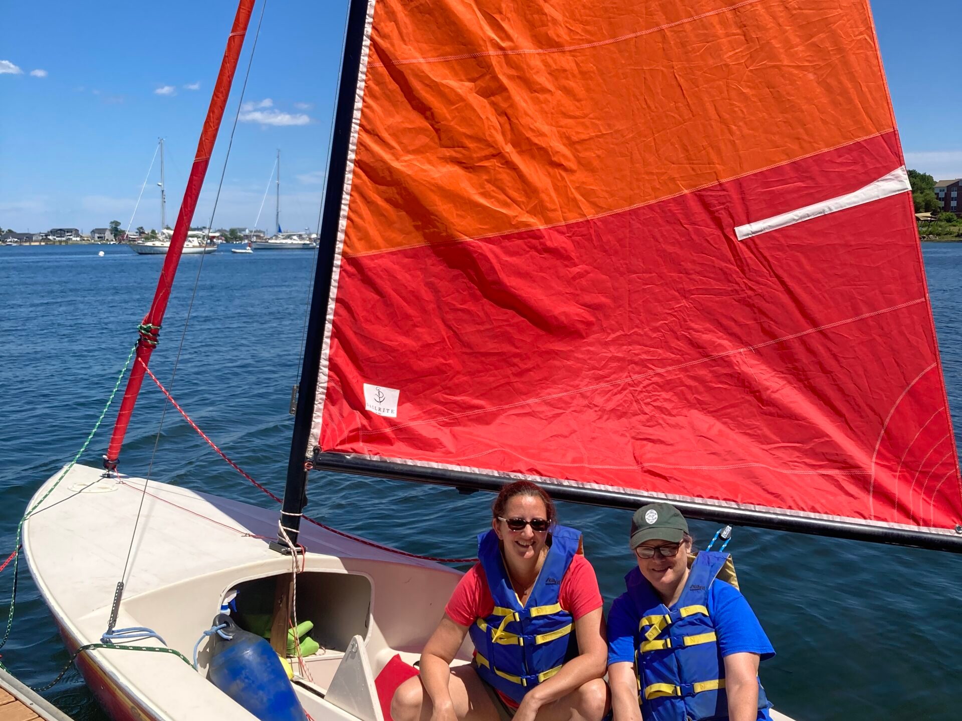 a person riding on the back of a boat