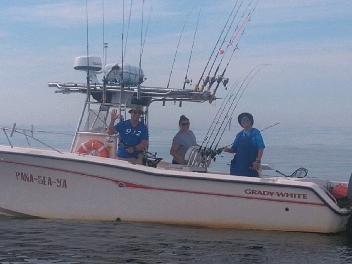 a small boat in a body of water