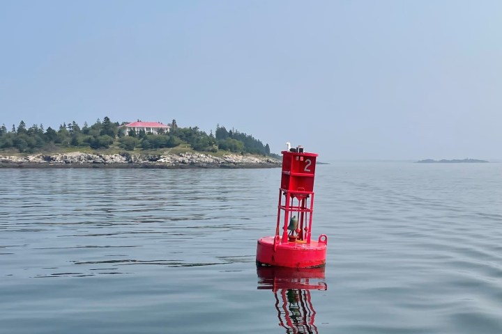 a small boat in a body of water