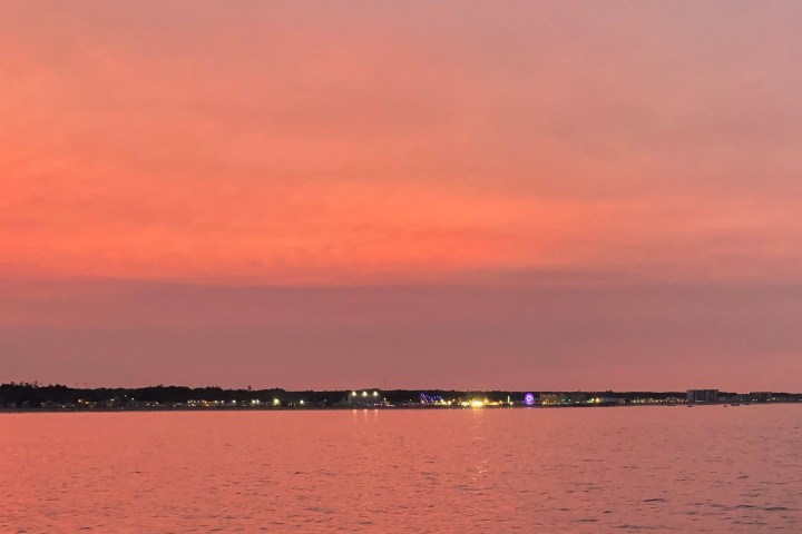 a sunset over a body of water