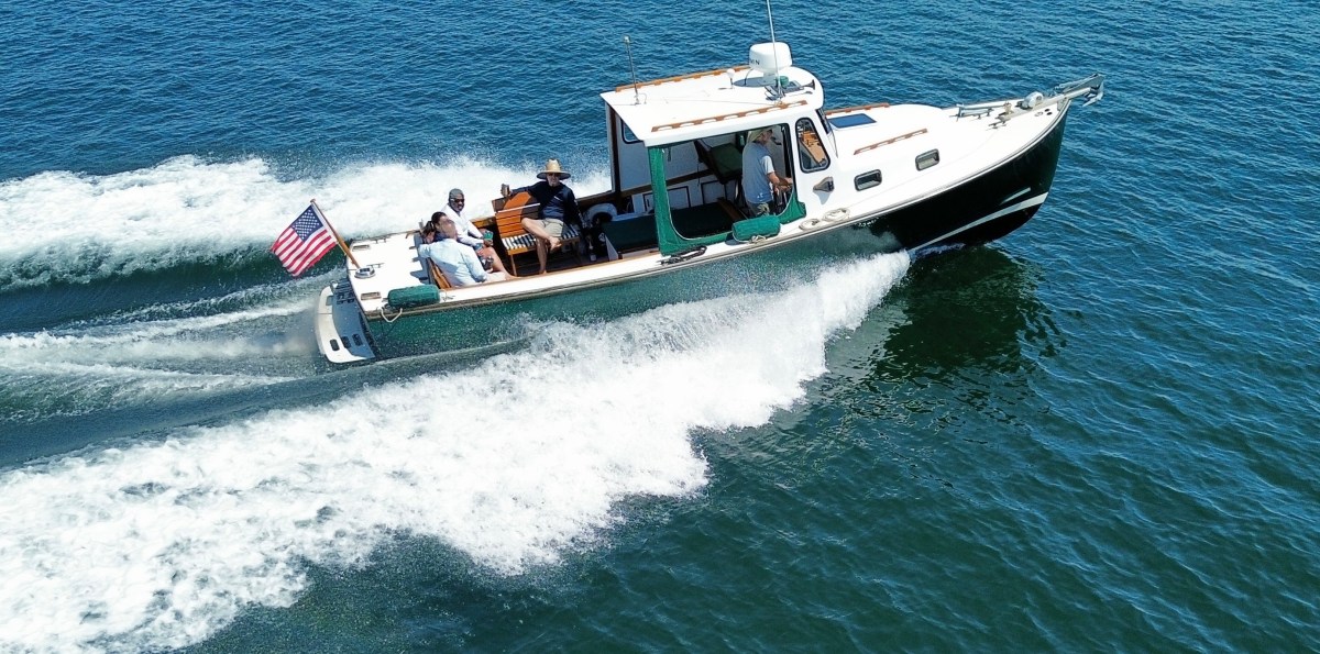 dji_fly_20240707_142544_25_1720384577851_photo_optimized_a22479 a group of people riding on the back of a boat in the water