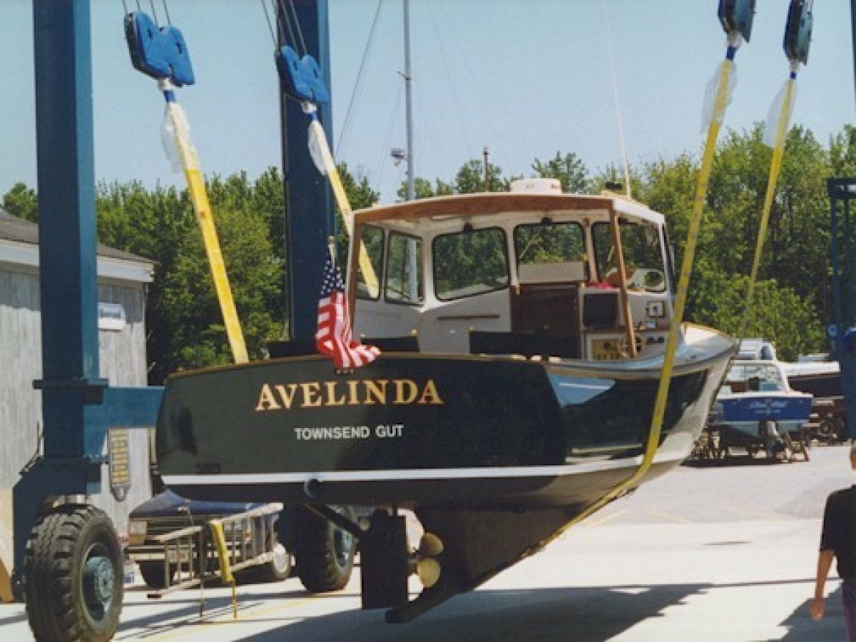 a boat parked on the side of a road